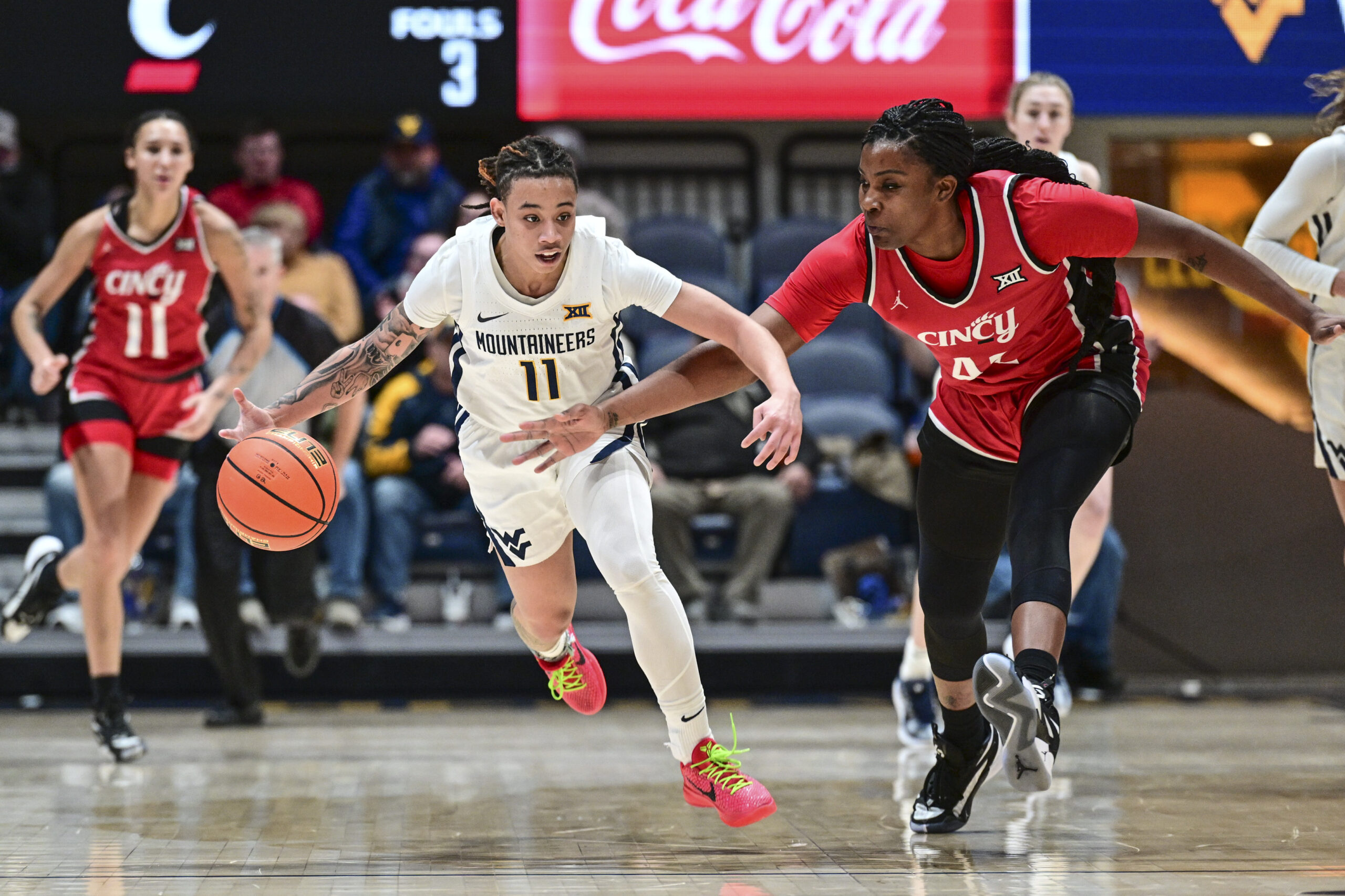 No. 24 WVU faces challenge of slowing down No. 10 Texas' high-scoring offense